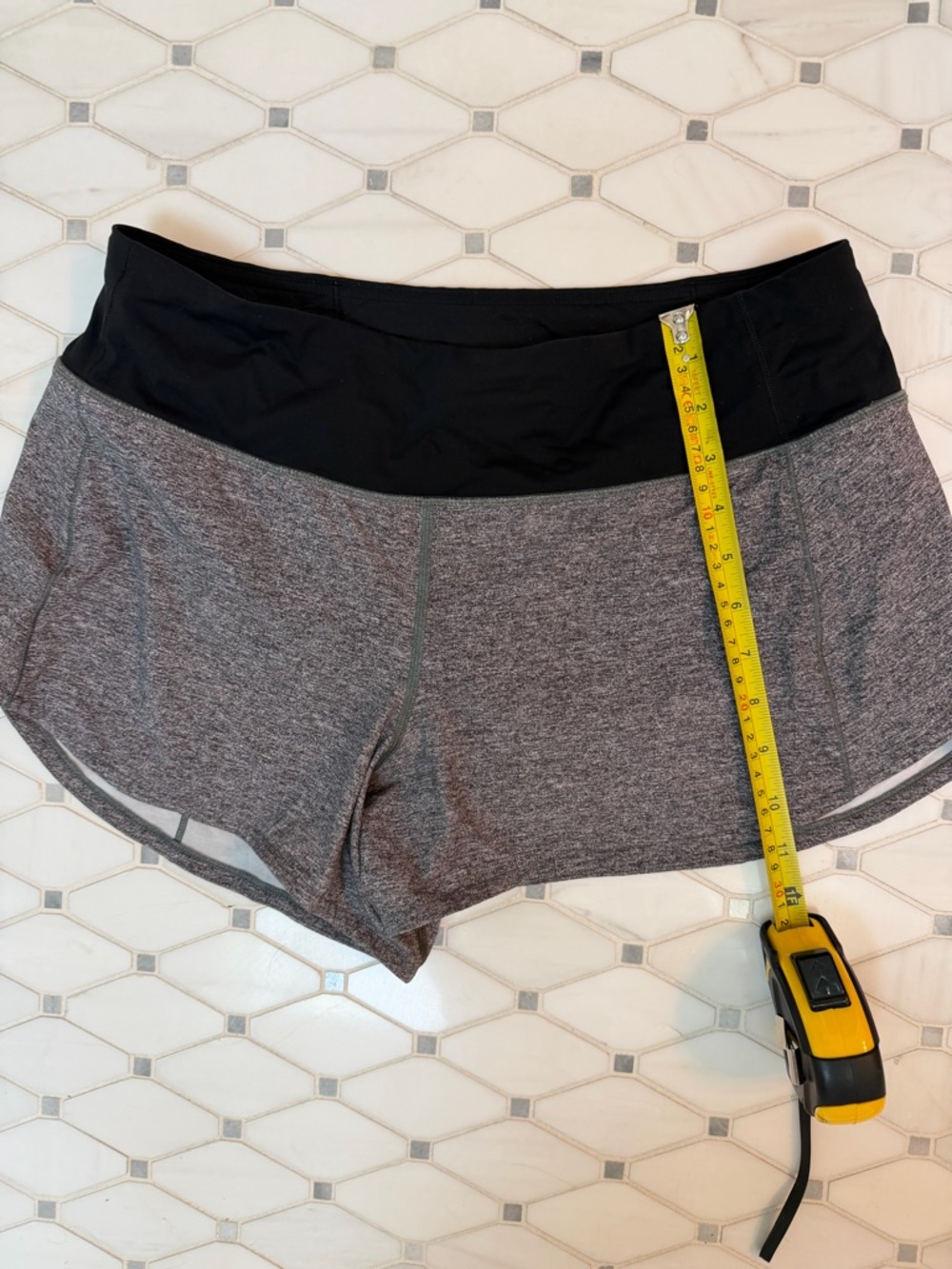 2 pairs of lululemon Gray and hot pink Shorts, great preowned condition